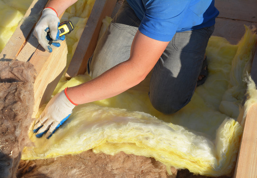 man removing an insulation