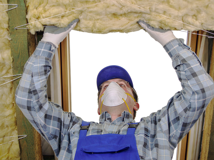 man removing an insulation